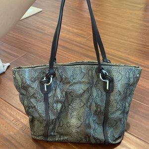 Snake skin Tumi purse